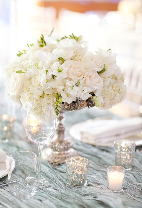 Silver Wedding theme reception centerpiece with candles