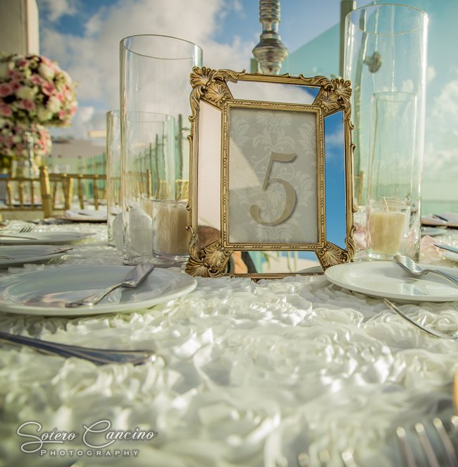 Stylish Beach Palace Sky Terrace ReceptionTable number  by Weddings Romantique