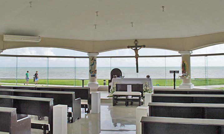 Stylish Palace Resorts Weddings_Moon Palace Catholic Gazebo Ocean View pews