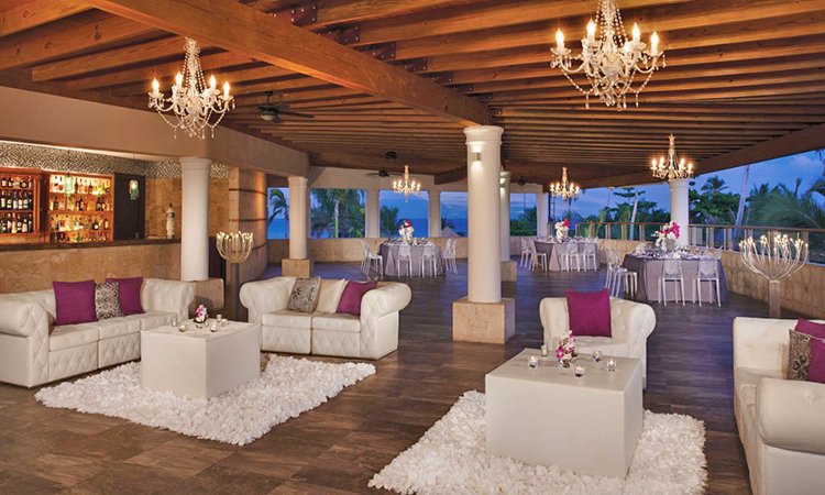 Dreams Punta Cana Resort & Spa Weddings_ Bordeaux Terrace lounge wedding reception decorations