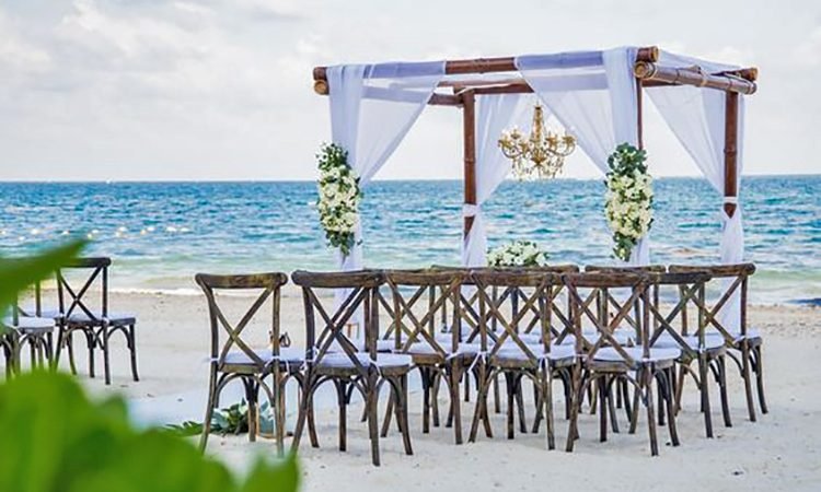 Dreams Riviera Cancun Weddings_ Boho Chic Beach Ceremony location Decorations
