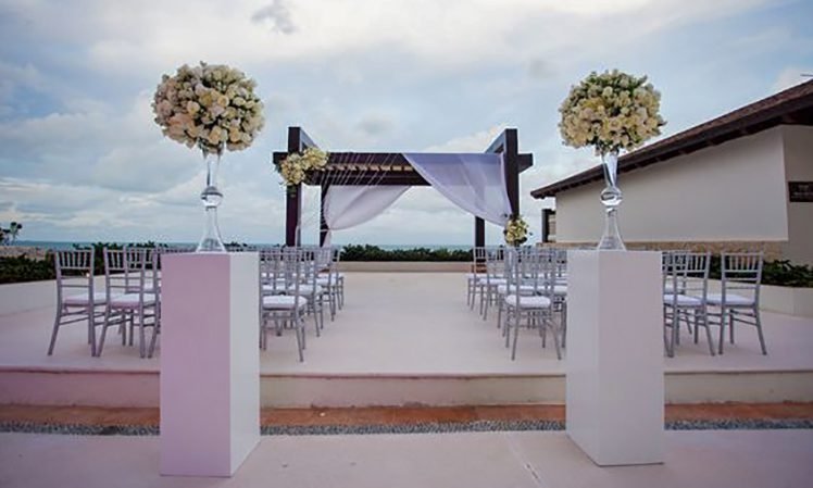 Secrets Playa Mujeres Weddings_Ocean Front Ceremony Terrace set up decorations